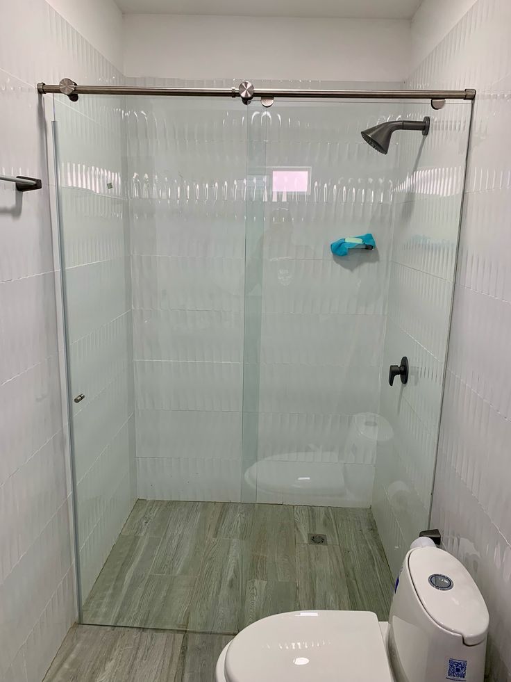 DIVISIÓN DE BAÑO CORREDIZA